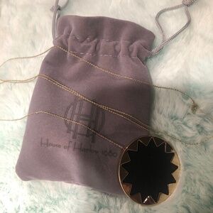 Just in Like New House of Harlow long gold and black Sunburst Pendant